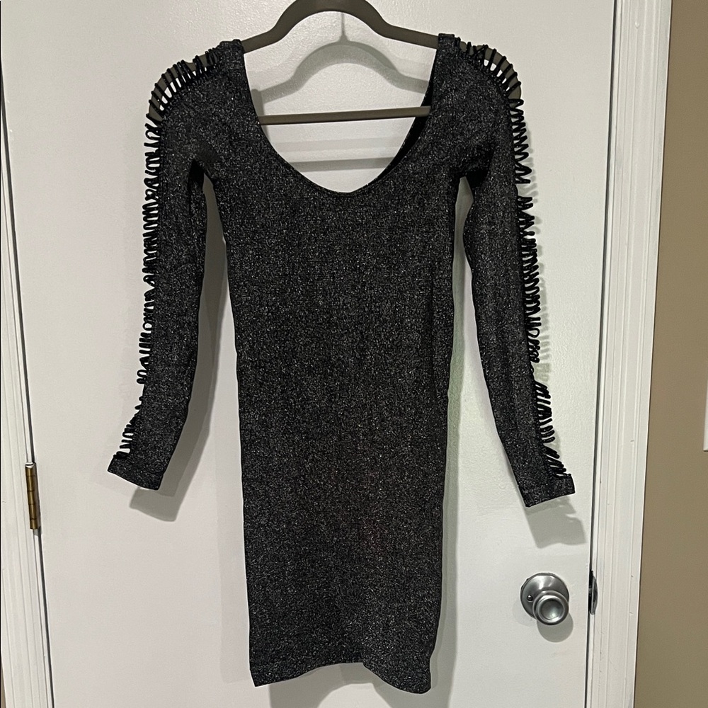 bebe Black with Silver GlitterLong Sleeve Dress with Unique Cutout Sleeve Design